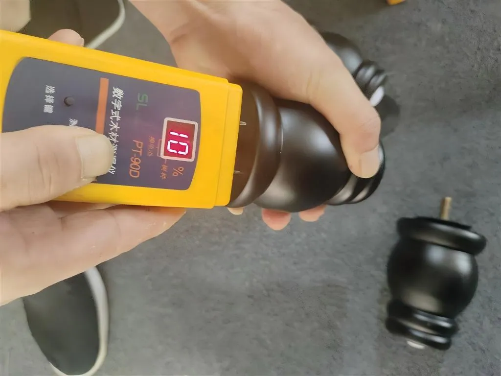 Moisture meter reading taken on a turned wooden furniture leg